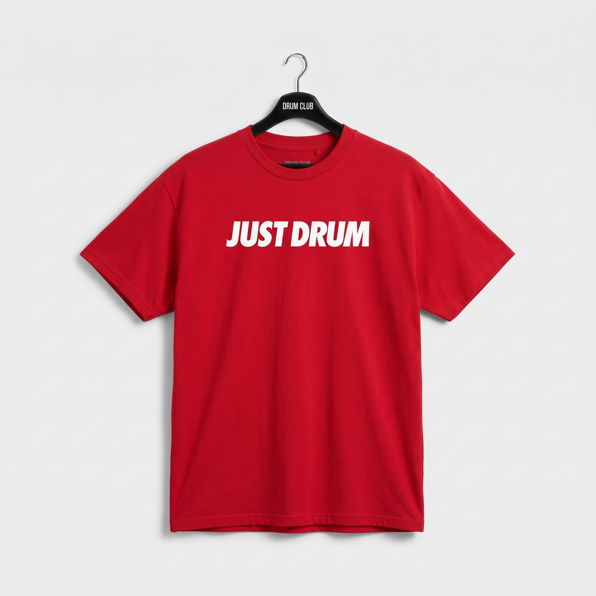 Red Drum Club T-shirt with white Just Drum lettering across the chest, front view.