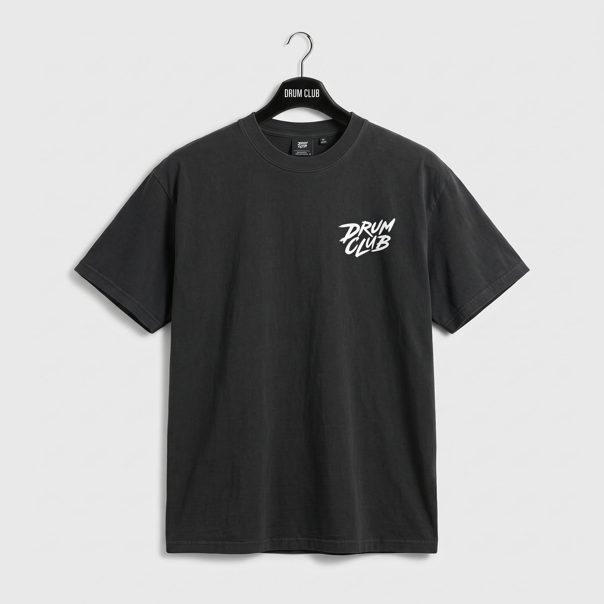 Charcoal Drum Club T-shirt with a small white logo on the left chest, front view.