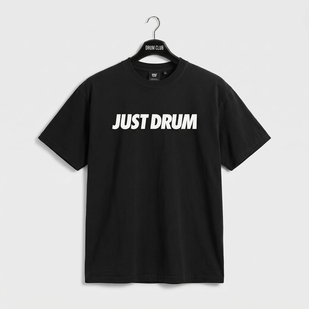 Black Drum Club T-shirt with white Just Drum lettering across the chest, front view.